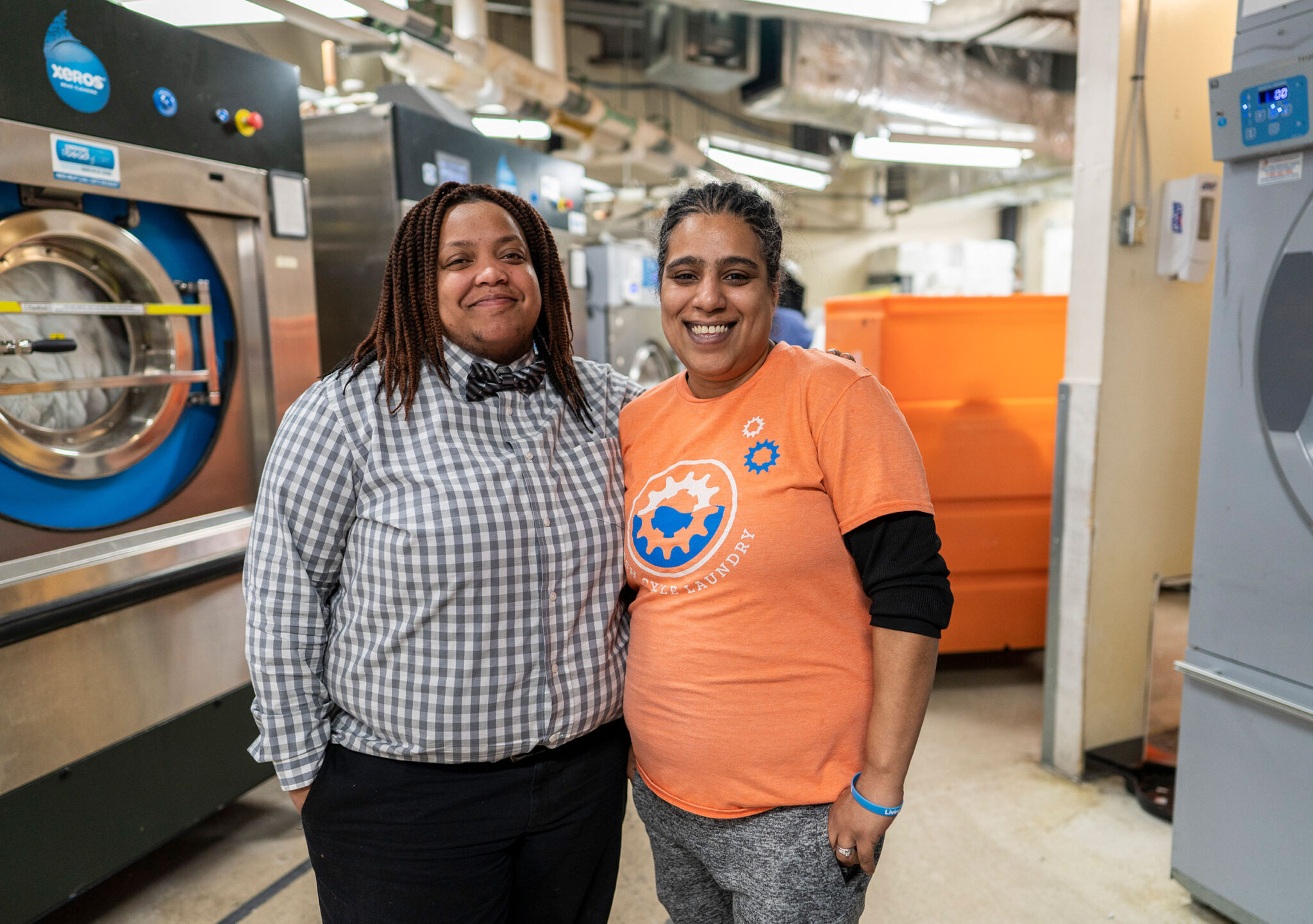 Postindustrial, General Manager Shanelle Morton, left, and Plant Manager Luz Adams, right, at Wash Cycle Laundry in Philadelphia. Photo by Jessica Kourkounis